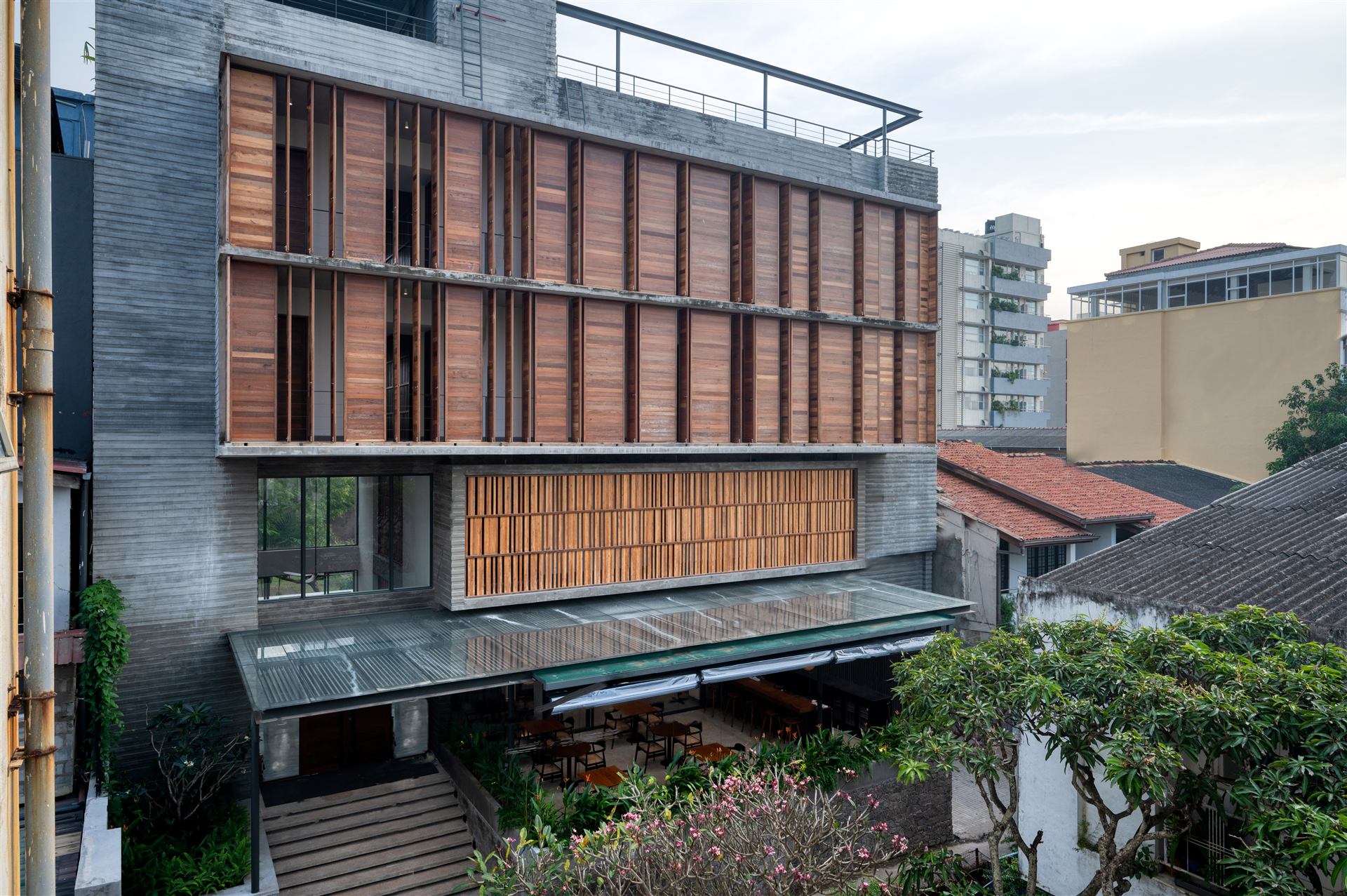 Taprobane House facade with timber louvres and rooftop terrace, Colombo 3