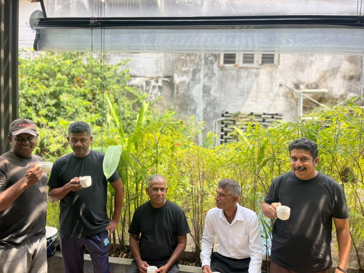 The Taprobane House team sharing a tea break on the terrace